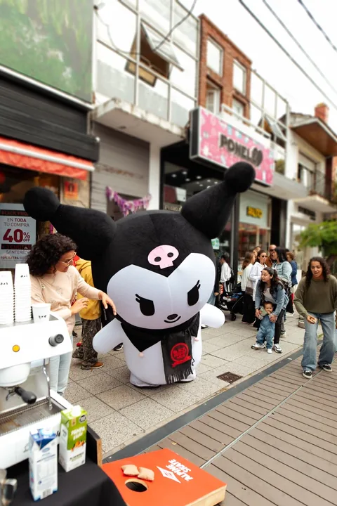 A costumed character outside the store